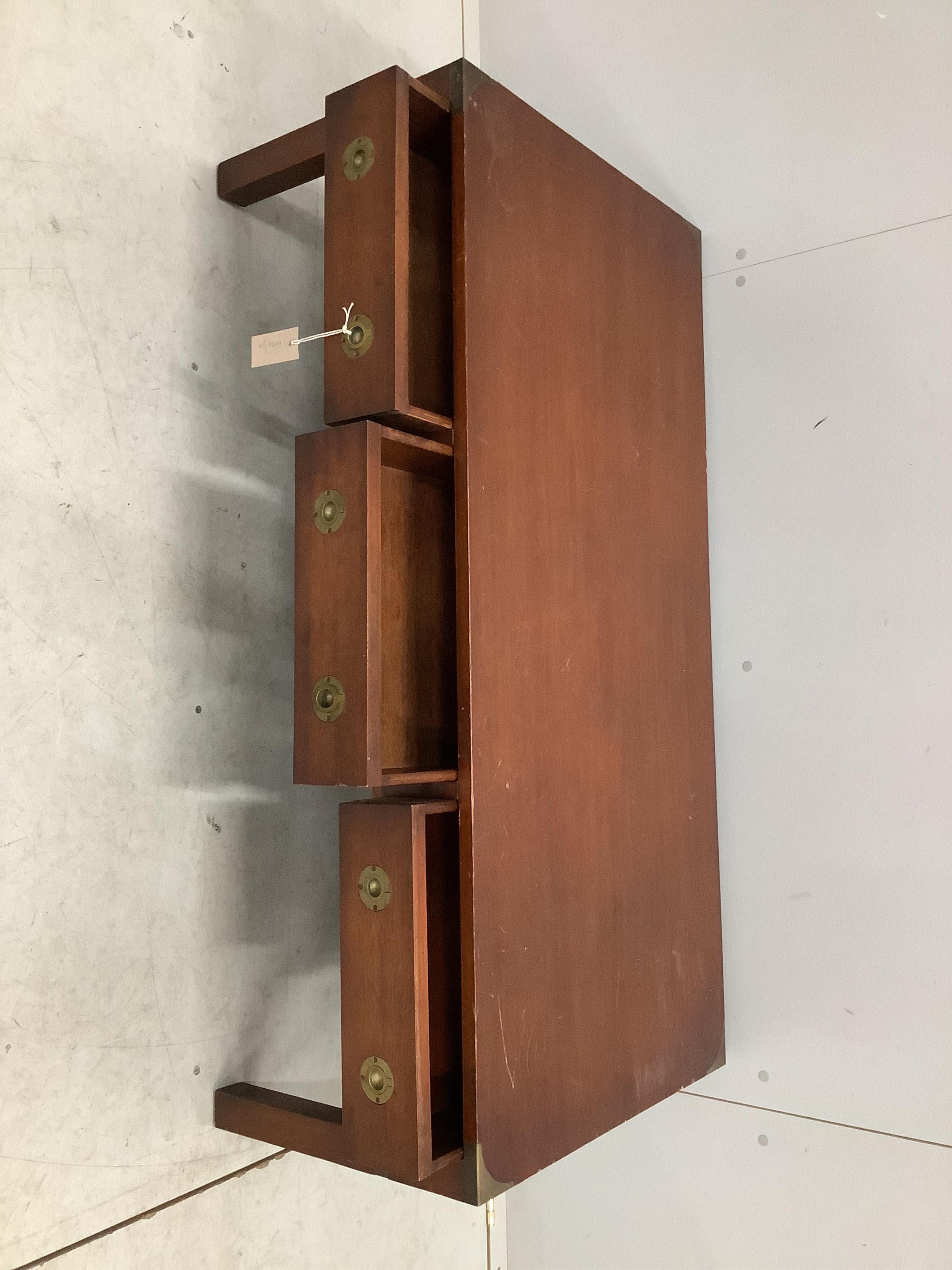 A military style brass mounted rectangular mahogany coffee table, dummy drawers to one side, width 122cm, depth 58cm, height 41cm. Condition - fair